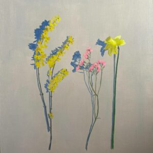 Deux fleurs jaunes et une fleur rose